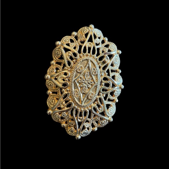 Vintage stretch black belt with gold decorative buckle 26” long x 2” wide. GVC - Picture 3 of 4